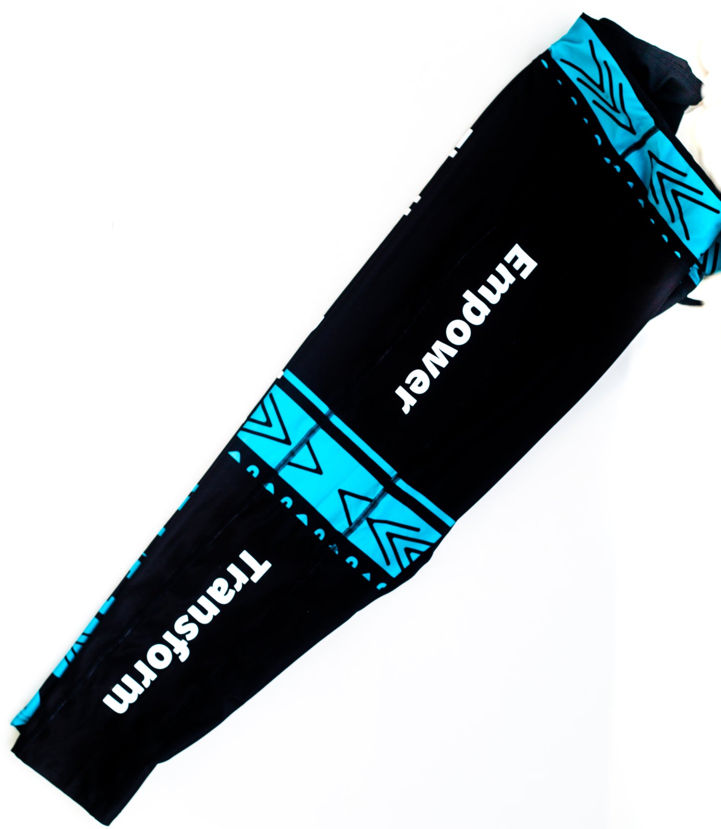Black Leggings with teal african design on legs come in plus sizes with phone pocket
